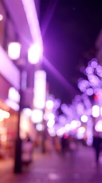 A Serene Evening Stroll Through a Blurred Street Illuminated with Vibrant Purple Lights and Softly Glowing Decorations, Creating a Magical Atmosphere for Passersby.