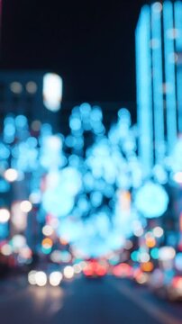 A Captivating Nocturnal Scene Featuring a Vivid Display of Twinkling Blue Lights and a Bustling Urban Street Filled with Ambient Energy and Excitement