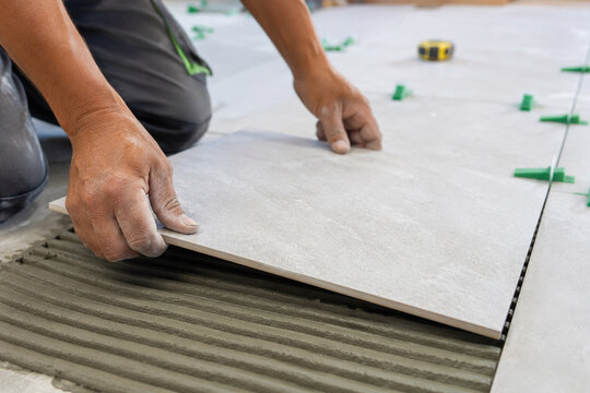 tile installation worker floor