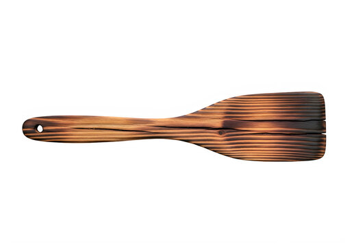Rustic wooden spatula with burnt texture and cracks isolated on transparent background
