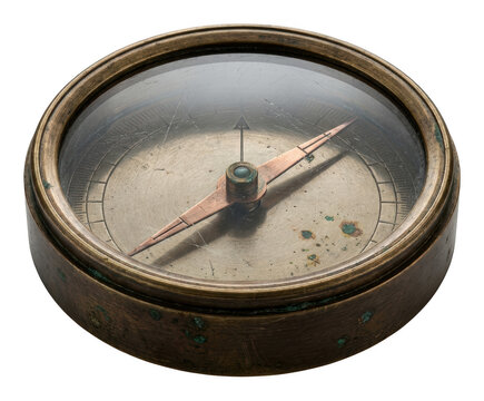 Vintage brass compass with a weathered patina and scratched glass, showing isolated transparent background image