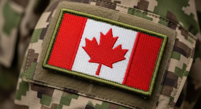 Canadian Flag Patch on Military Camouflage Uniform, Close-up of Canada National Emblem on Soldier's Sleeve