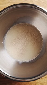 Dry yeast and sugar are added to milk for brioche dough. Brioche dough combines milk, yeast, sugar, egg, butter and flour. Use brioche dough for bread loaves, burger buns, cinnamon rolls or doughnuts.