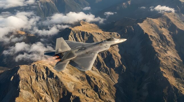 Stealth fighter jet flies over rugged mountains with afterburners active.