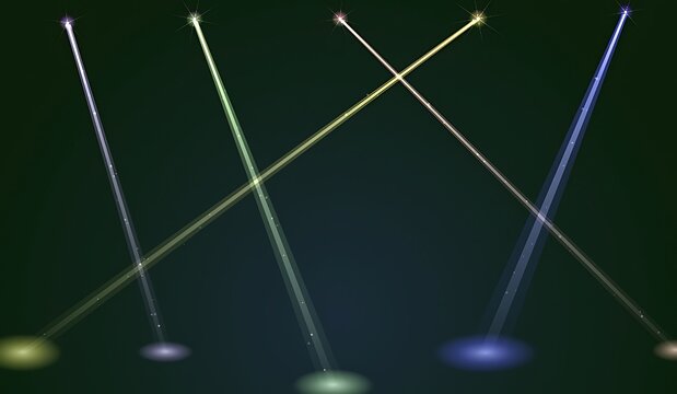 Vertical stage spotlights with colorful light beams crossing on dark background