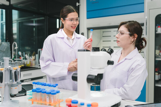 Innovative medical biotechnology research by scientists in a laboratory setting engaging collaboration and discovery