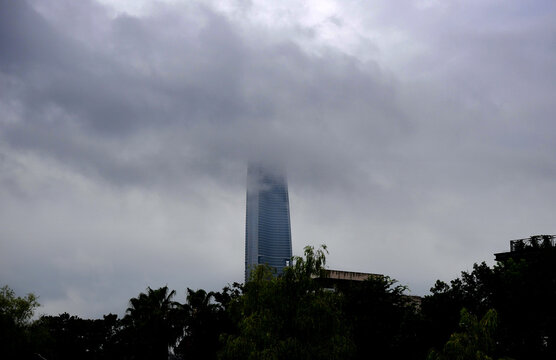 Wuhan Skyscraper Looming Through Dark Cloudy Skies