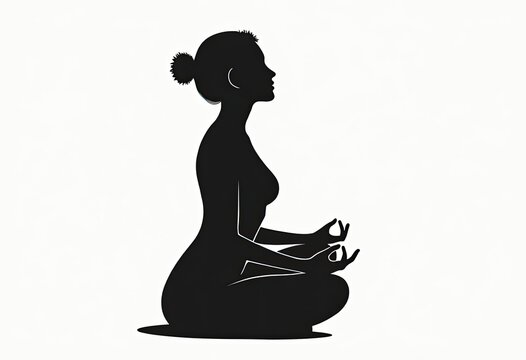 Silhouette of woman meditating in lotus pose side view
