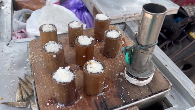 Traditional Indonesian putu cake steamed in bamboo tubes