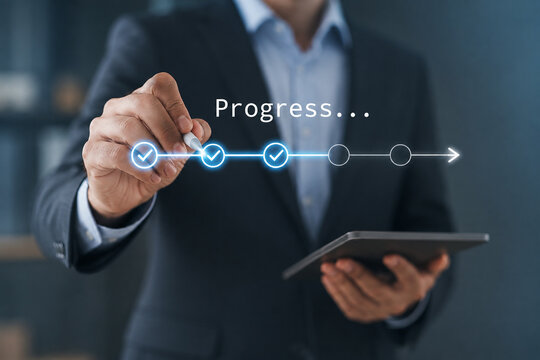 
Businessman drawing a progress timeline with checklist icons, symbolizing project management, workflow milestones, strategic planning, business success, and digital growth. 