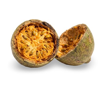 Cracked Bael Fruit Studio Shot Revealing Seeds and Pulp