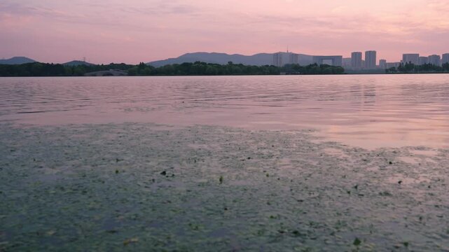 Serene Twilight Over Still Waters: A Tranquil Evening Landscape  
