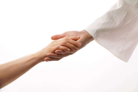 The touch of Jesus Christ&rsquo;s love, salvation, healing, and comfort that holds the weary hands of humanity
