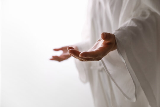 God's merciful hand giving love, hope, and peace, the resurrection of Jesus Christ and Easter background
