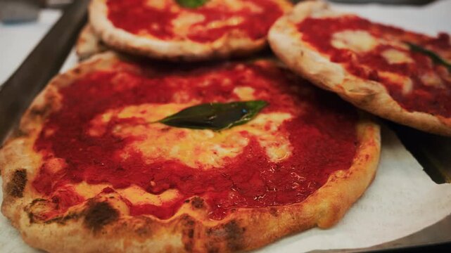Neapolitan pizza displayed in a street food truck in Napoli
