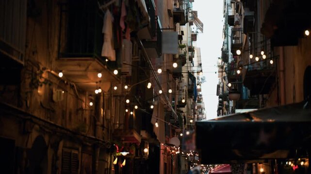 Lights in the narrow pub lined alleys, amidst street food spots