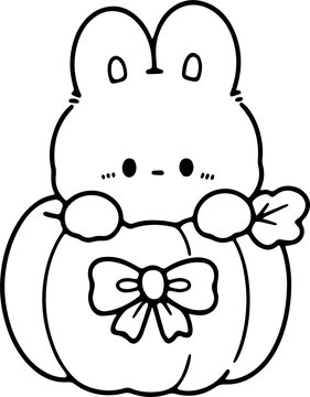 Cute Bunny Peeking Out of Pumpkin