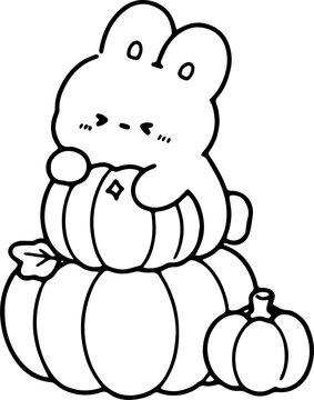 Cute Bunny Sitting on Pumpkins