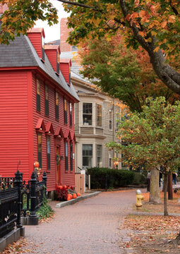 City street on autumn featuring historic New England houses in Salem, Massachusetts