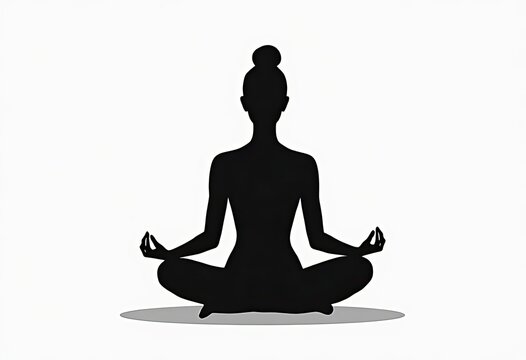 Silhouette of person sitting in meditation pose cross-legged