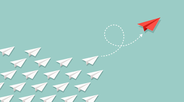 Red paper airplane veering away from white group on teal background vector