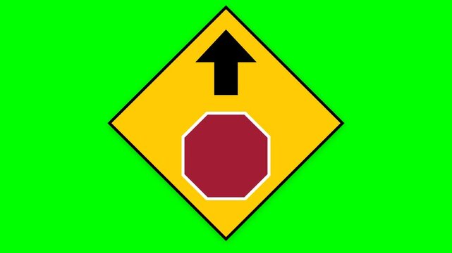 Road sign featuring a yellow diamond with a black arrow and red octagon symbol warns drivers of upcoming intersection traffic conditions.