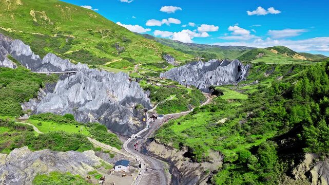 Aerial view of the stone forest at Bamei Moshi Park with walking paths in Garze, Sichuan, China.