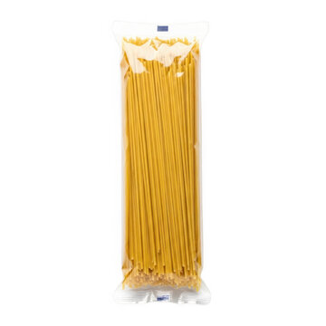 Fresh uncooked spaghetti noodles in a tube