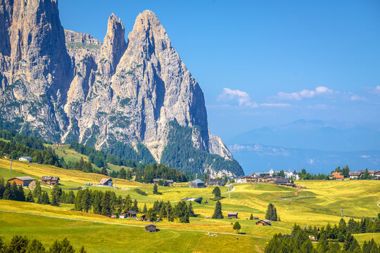Idyllic Alpine meadows of Seiser Alm and cliffs of Schlern mountain. Alpe di Siusi.