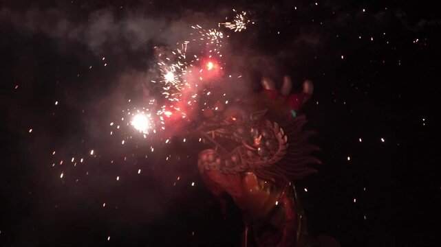 Chinese dragon performing at night.