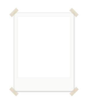 Blank polaroid photo frame taped on all four corners