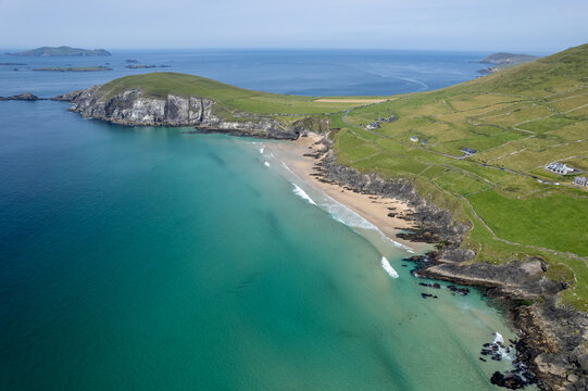 Drone aerial seascape of Coumeenoole beach dingle peninsula ireland atlantic coastline. Blue water slea head Drive wild atlantic way. Irish coastal scenic route