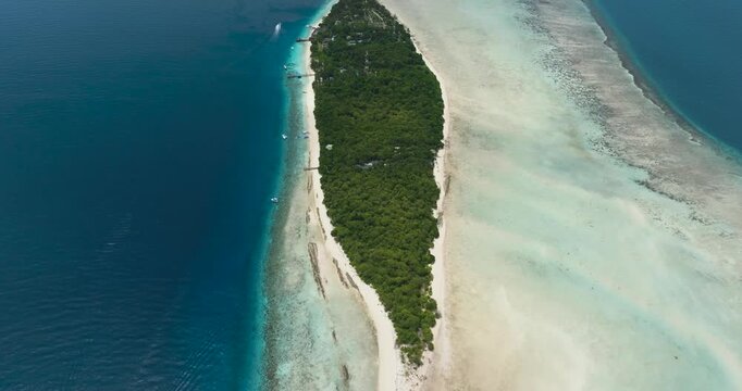 Top view of atoll and tropical island Mataking with beach. Tun Sakaran Marine Park. Borneo, Sabah, Malaysia.