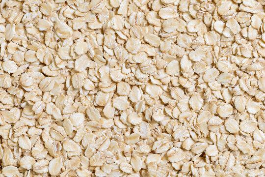 Close Up Detailed Texture of Raw Oatmeal Grain Flakes