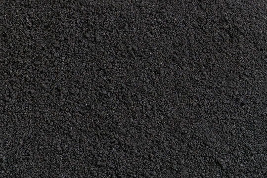 Dark Crushed Black Stone Grain Texture Background