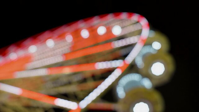Abstract soft focus lights of a ferris wheel