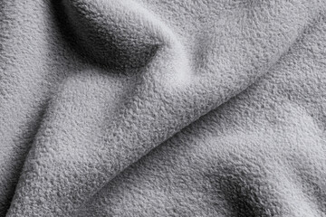 Grey Fleece Fabric Texture Close Up with Folds © Clint