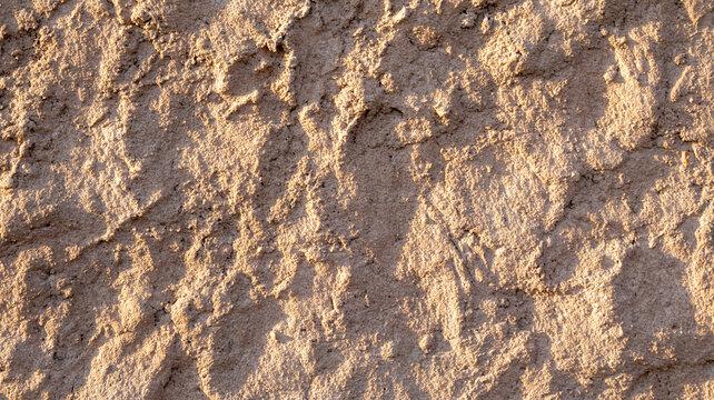 Textura de pared de barro seco y r&uacute;stico