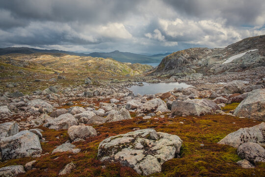 Dramatic landscape view of mountain wilderness near Tyinholmen lake, Jotunheimen, Norway