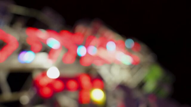 soft focus colorful lights of fair rides