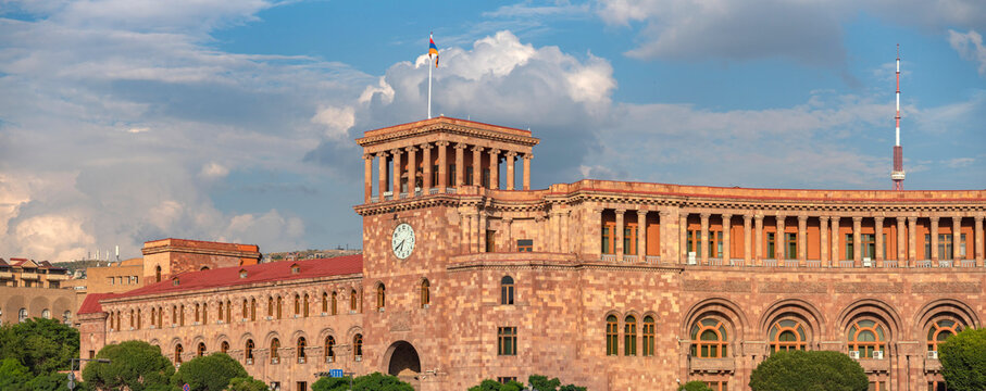Government House of Armenia with clock tower at Republic Square in Yerevan, wide panoramic view with copy space