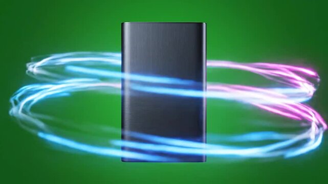 Low-angle view of portable hard drive in green studio