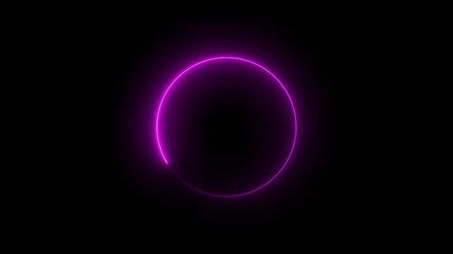A bright glowing neon pink circle frame with a vibrant light effect isolated on a solid dark black background