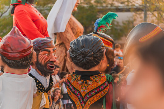 Gigantes y Cabezudos Parade During El Pilar festivities in October in Zaragoza, Aragon, Spain. Cabezudo called 'La Forana'.