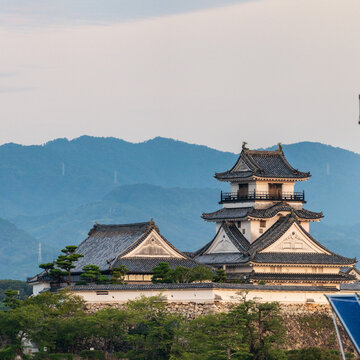 Original castle tower of Kochi Castle illuminated by morning light in Kochi Prefecture, Japan.