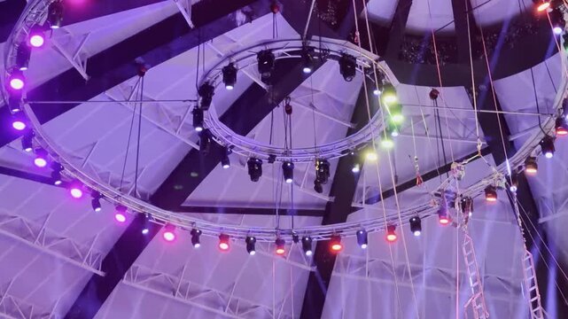 Captivating Stage Lighting Set Against the Exquisite Architecture of a Modern Circus  