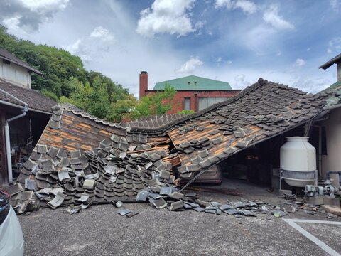 Destroyed Tiled Roof Inward Collapse After Earthquake Disaster