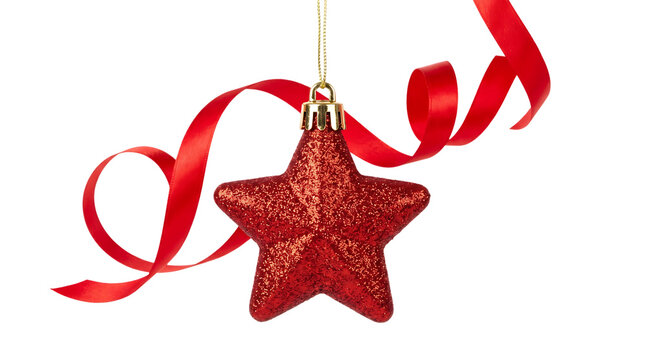 A dazzling red glitter star christmas ornament hangs gracefully with a flowing red ribbon evoking holiday cheer
