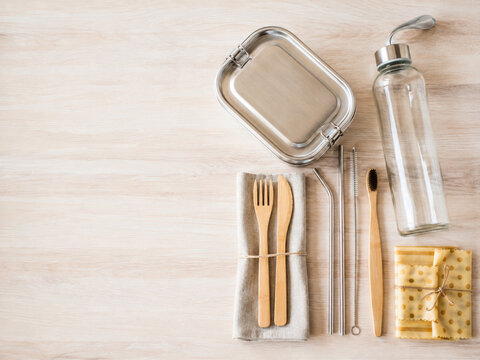 Reusable zero waste items with lunch box bottle and bamboo cutlery