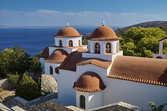 Agiou Sarvas monastery, two churches with domed roofs in a quiet landscape with sea views, Pothia, main town, port, Kalymnos, Sponge Diving Island, Dodecanese, Greek Islands, Greece